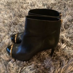 Tory Burch Black Heels with Gold Detailing.